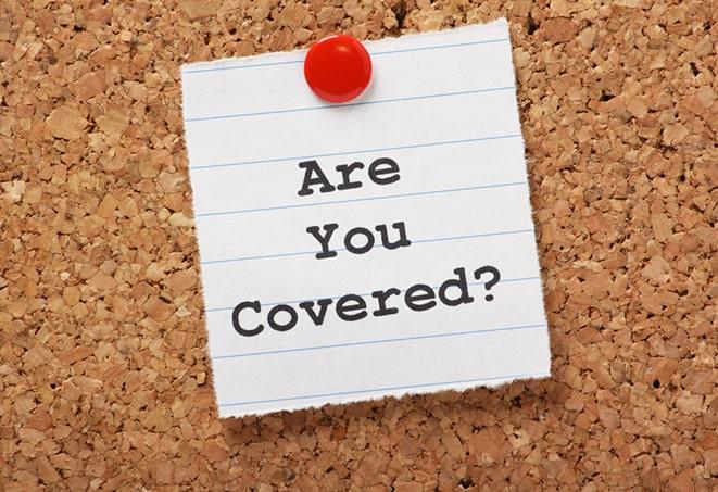 a motorcycle insurance agent explaining coverage options in Brandon